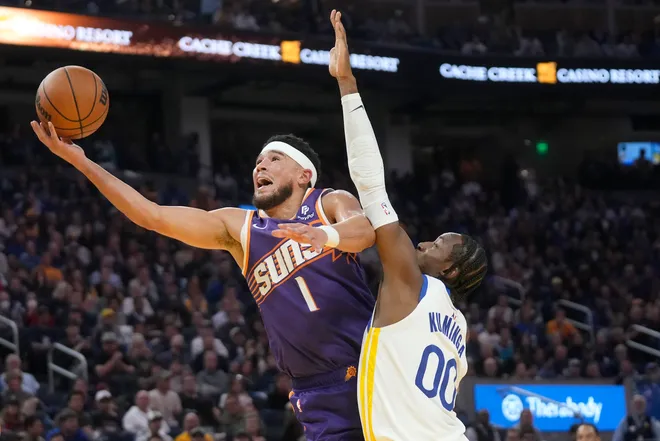 Booker drops 32 to lead Suns over Warriors in season opener Image