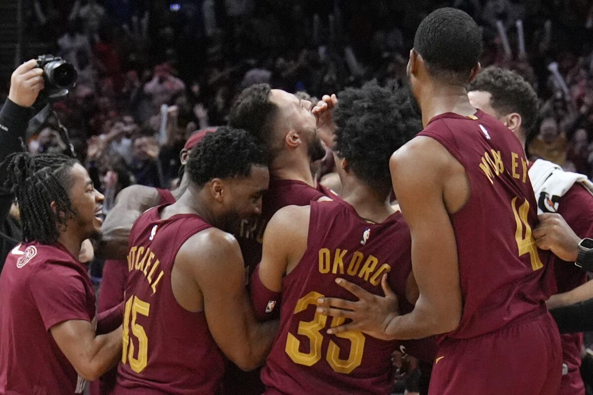 Strus' halfcourt prayer answered as Cavs stun Mavs Image